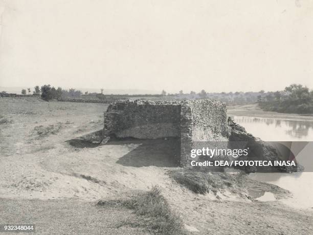 View of the ruins of the Roman Maurella bridge over the Calore river and the site where Manfredi was buried, Benevento, Campania, Italy, photograph...