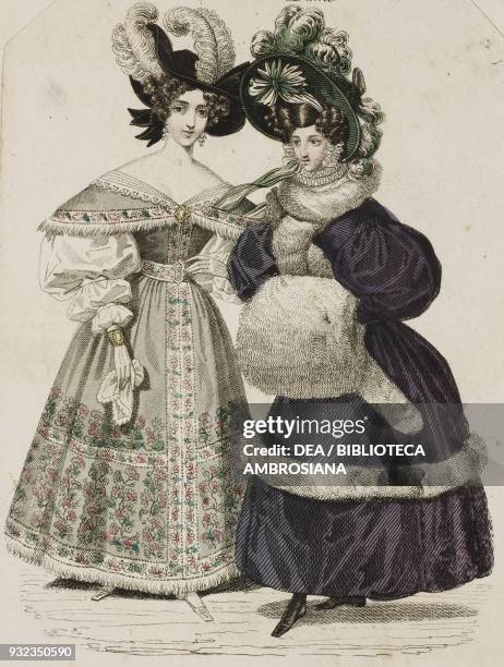 Woman wearing a green dress generously adorned with floral motifs, with puffed sleeves and black hat adorned with light-coloured feathers, and a...