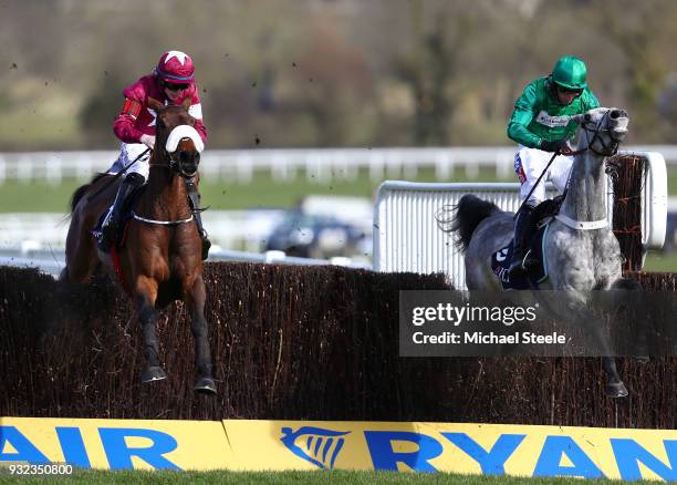 Shattered Love ridden by Jack Kennedy jumps the last in front of Terefort ridden by Daryl Jacob on their way to victory in the JLT NoviicesÕ Chase at...