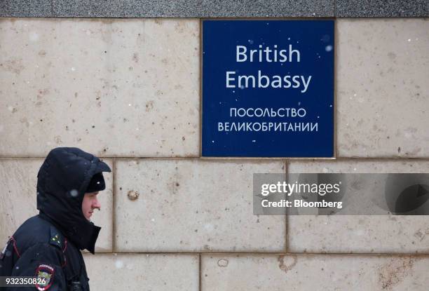 Russian policeman guards the entrance to the British Embassy in Moscow, Russia, on Thursday, March 15, 2018. The leaders of the U.S., Germany and...