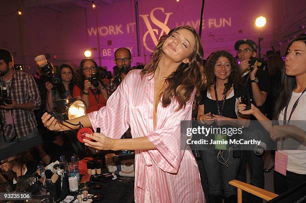 Model Miranda Kerr attends the hair & makeup preparations for the 2009 Victoria's Secret fashion show>> at The Armory on November 19, 2009 in New...