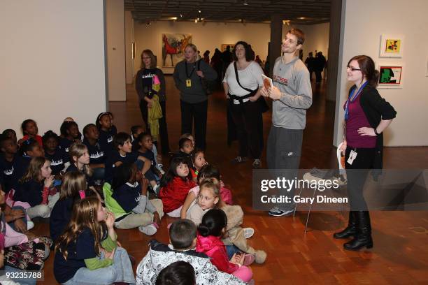 Luke Ridnour of the Milwaukee Bucks reads to students during the Read to Achieve event sponsored by the Bucks and the Sam's Hope Literacy Foundation...