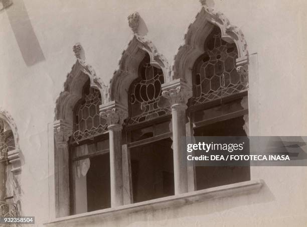 Gothic-style triple lancet window, Pascoli house, Venzone, Friuli-Venezia Giulia, Italy, photograph from Istituto Italiano d'Arti Grafiche, Bergamo,...