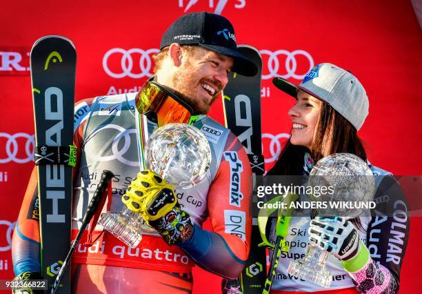 The men's overall season's Super-G winner Norway's Kjetil Jansrud and the women's overall season's Super-G Liechtenstein's Tina Weirather pose with...