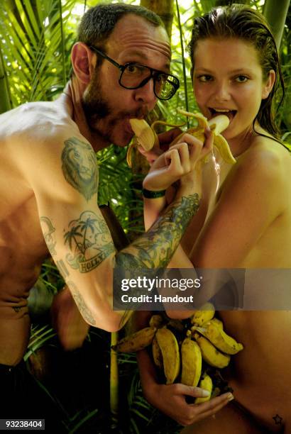 In this undated handout image provided by Pirelli, model Enriko Mihalik and photographer Terry Richardson pose during the creation of the new 2010...