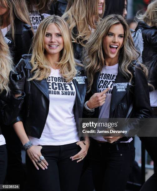 Victoria's Secret Supermodels Heidi Klum and Alessandra Ambrosio take over Times Square for the Victoria's Secret Fashion Show at Military Island on...