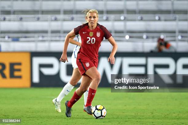 United States midfielder Allie Long dribbles the ball during the SheBelieves Cup match between USA and England on March 07 at Orlando City Stadium in...