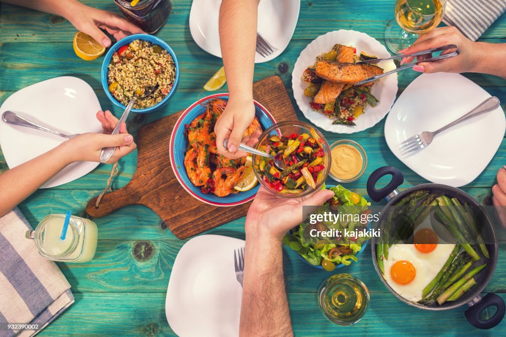 Young Family Having Lunch at Home