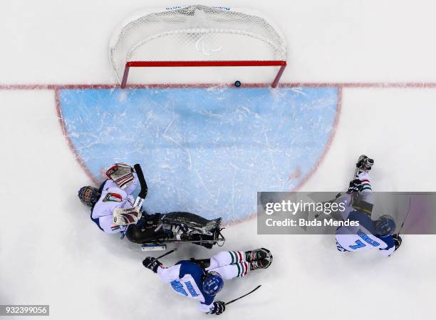 Goalkeeper Santino Stillitano of Italy looks dejected after he gets a goal in the Ice Hockey semifinals playoff game between United States and Italy...