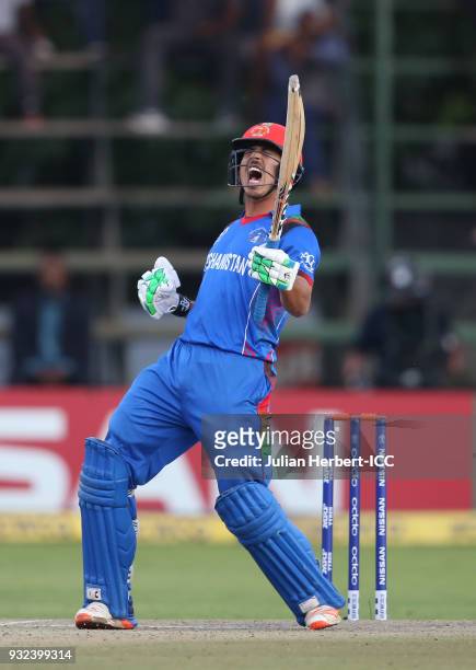 Sharafuddin Ashraf of Afghanistan celebrates his teams victory during The ICC Cricket World Cup Qualifier between The West Indies and Afghanistan at...