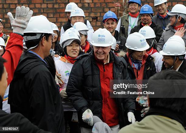 Former U.S. President Jimmy Carter attends a Habitat for Humanity work project in Qionglai in southwest China's Sichuan province Thursday November...