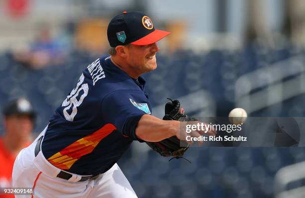 Joe Smith of the Houston Astros in action against the Miami Marlins during a spring training game at Fitteam Ballpark of the Palm Beaches on March 7,...