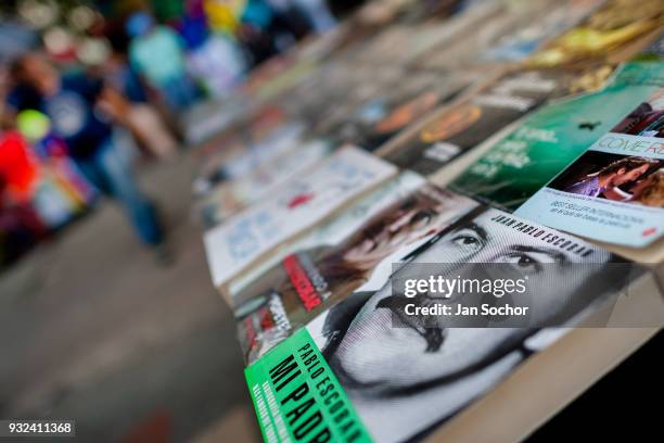 Paperback book, depicting the drug lord Pablo Escobar on the cover, is seen arranged at the market stand on the street in Medellín, Colombia on...