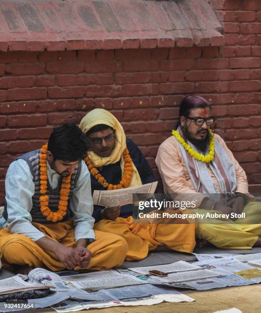 reading the scriptures - chanting mantra stock-fotos und bilder