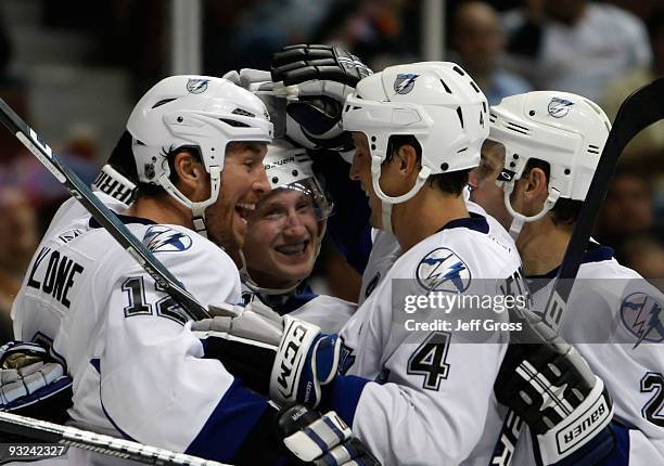 Ryan Malone, Steven Stamkos, Vincent Lecavalier and Lukas Krajicek of the Tampa Bay Lightning celebrate Stamkos' second period goal against the...