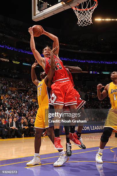 Joakim Noah of the Chicago Bulls pulls down a rebound against the Los Angeles Lakers at Staples Center on November 19, 2009 in Los Angeles,...