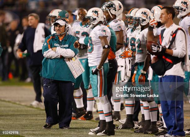 Head coach Tony Sparano of the Miami Dolphins walks the sidelines against the Carolina Panthers during their game at Bank of America Stadium on...