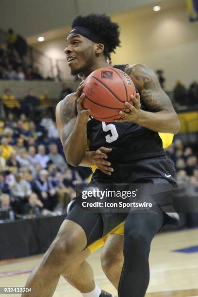 Harvard Crimson guard Rio Haskett shoots during a National Invitation Tournament game between the Marquette Golden Eagles and the Harvard Crimson at...