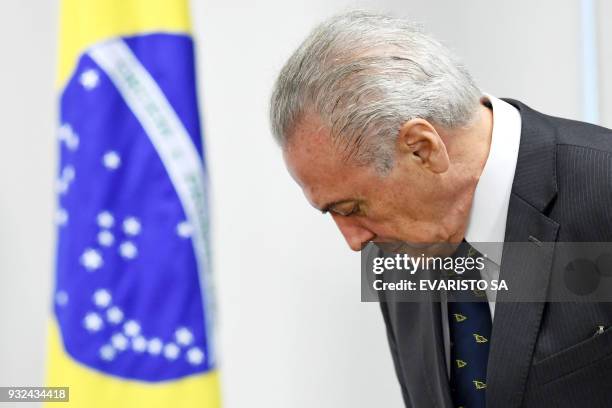 Brazilian President Michel Temer is pictured during the signing ceremony of an agreement for the construction of a Bus Rapid Transit system in...