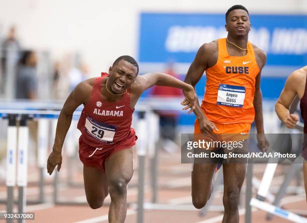 Ruebin Walters of the University of Alabama and Angelo Goss of Syracuse University compete in Heat 2 of the Mens 60 Meter Hurdles Preliminaries...