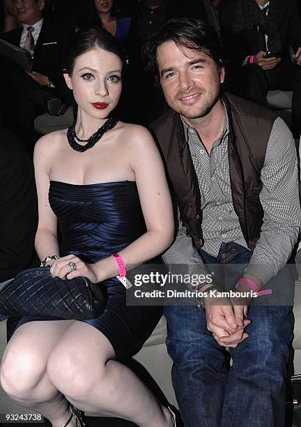 Michelle Trachtenberg and Matthew Settle attend the 2009 Victoria's Secret fashion show at The Armory on November 19, 2009 in New York City.