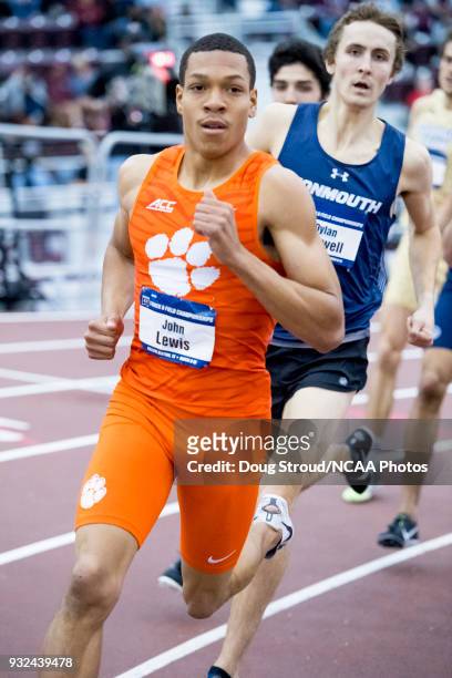 John Lewis of Clemson University leads with Dylan Capwell of Monmouth University following in the Mens 800 Meter Run during the Division I Men's and...