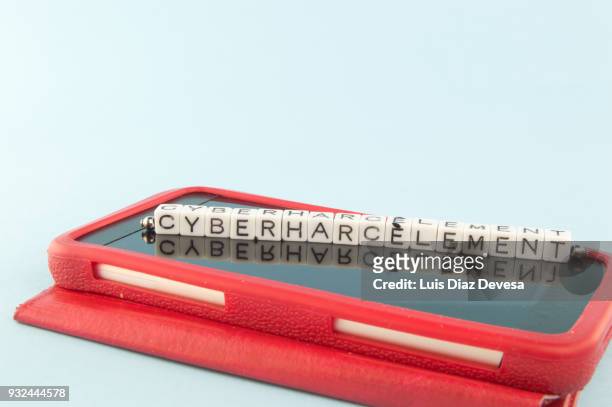 "cyberbullying" in french language on - rna virus stock pictures, royalty-free photos & images