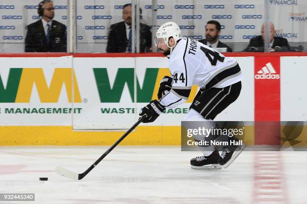 Nate Thompson of the Los Angeles Kings skates the puck up ice against the Arizona Coyotes at Gila River Arena on March 13, 2018 in Glendale, Arizona.