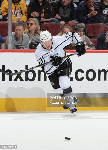 Tyler Toffoli of the Los Angeles Kings passes the puck up ice against the Arizona Coyotes at Gila River Arena on March 13, 2018 in Glendale, Arizona.