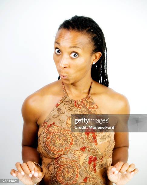 woman with surprised expression - top mit nackenverschluß stock-fotos und bilder