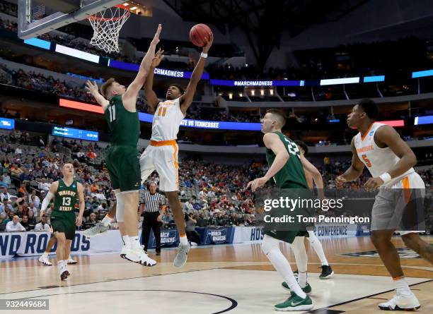 Kyle Alexander of the Tennessee Volunteers goes up for a shot against Loudon Love of the Wright State Raiders in the first half in the first round of...