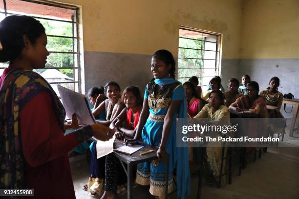 Unmarried girls, ages 15 to 19, attend a Pathfinder International training about adolescent sexual and reproductive health. Girls in this age group...