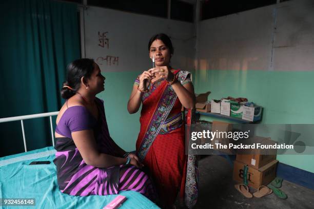 Staff nurse at a private DIMPA OB-GYN clinic in rural Bihar provides information on injectable contraceptive to a client before its administration....