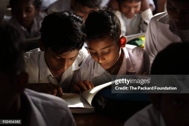 Students read in class at Middle School Keoti Balak. Teachers at the school deliver CorStone's Youth First program, an integrated emotional...