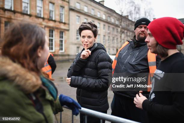 Catriona Balfe from the TV series Outlander departs a filming location at St Andrew's Square on March 15, 2018 in Glasgow, Scotland. Dozens of fans...