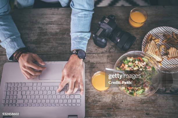 photo editor working on computer. - average photo editing by professional photographers stock pictures, royalty-free photos & images