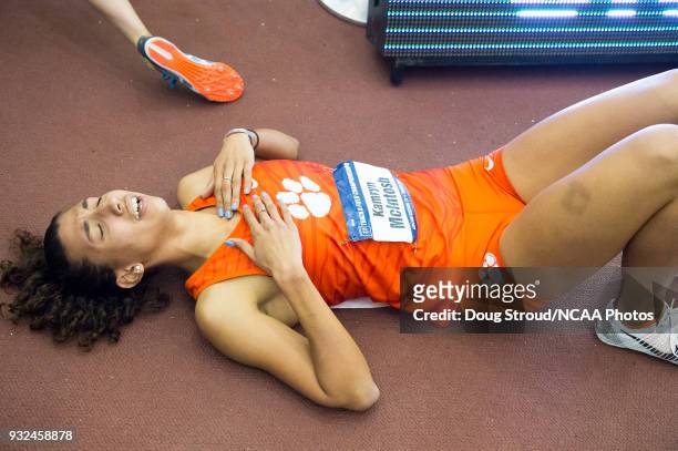 Kamryn McIntosh of Clemson University collapses at the end of her leg of the Women's Distance Medley during the Division I Men's and Women's Indoor...