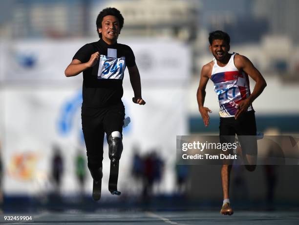 Kunikazu Nakamura of Japan competes in 100 meters race during the 10th Fazza International IPC Athletics Grand Prix Competition - World Para...