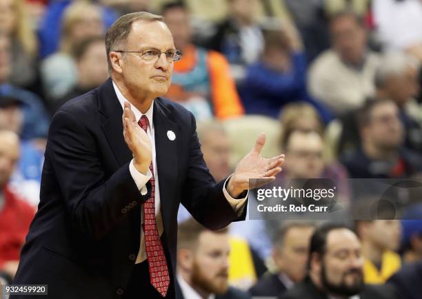 Head coach Lon Kruger of the Oklahoma Sooners watches his team in the second half of the game against the Rhode Island Rams during the first round of...