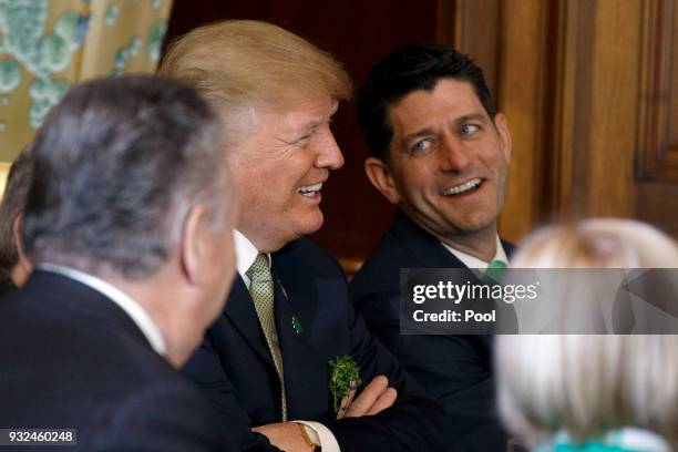 United States President Donald J. Trump laughs with United States Speaker of the House of Representatives Paul Ryan, Republican of Wisconsin, at the...