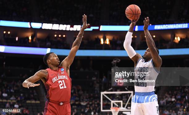 Jared Terrell of the Rhode Island Rams puts up a jump shot over Kristian Doolittle of the Oklahoma Sooners in the first half during the first round...
