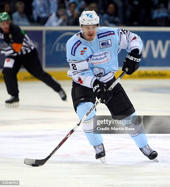 Vitalij Aab of Hamburg skates with the puck during the DEL match between Hamburg Freezers and Adler Mannheim at the Color Line Arena on November 19,...