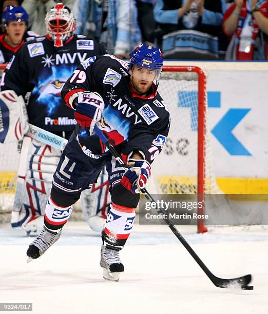 Mario Scalzo of Mannheim skates with the puck during the DEL match between Hamburg Freezers and Adler Mannheim at the Color Line Arena on November...