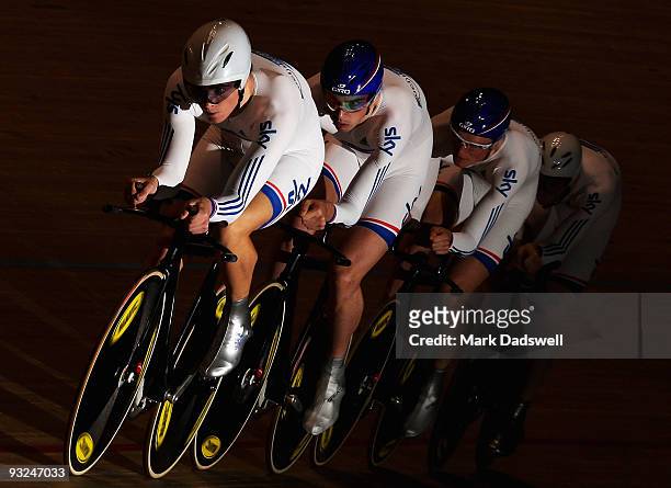The Great Britain Men's Pursuit Team of Steven Burke, Edward Clancy, Andrew Fenn and Andrew Tennant on their way to winning the Silver Medal during...