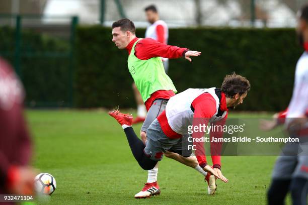 Pierre-Emile Højbjerg and Manolo Gabbiadini, during a Southampton FC first team training at Staplewood Complex on March 15, 2018 in Southampton,...