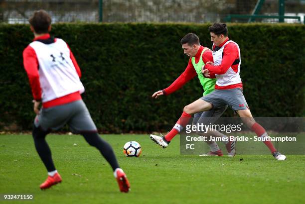 Manolo Gabbiadini, Pierre-Emile Højbjerg, Alfie Jones during a Southampton FC first team training session at Staplewood Complex on March 15, 2018 in...
