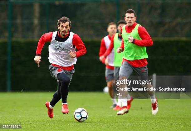 Manolo Gabbiadini and Pierre-Emile Højbjerg during a Southampton FC first team training at Staplewood Complex on March 15, 2018 in Southampton,...