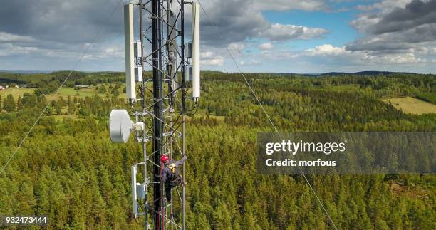 working at height - microwave tower stock pictures, royalty-free photos & images