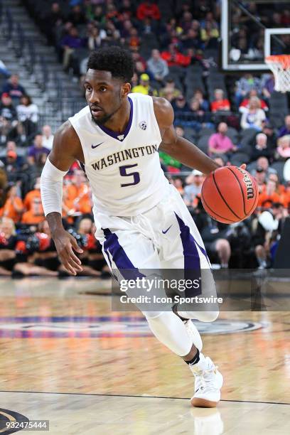 Washington guard Jaylen Nowell drives to the basket during the first round game of the mens Pac-12 Tournament between the Washington Huskies and the...