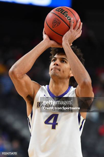 Washington guard Matisse Thybulle shoots a free throw during the first round game of the mens Pac-12 Tournament between the Washington Huskies and...